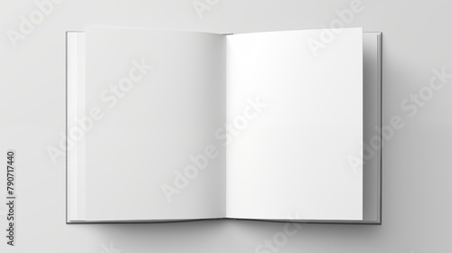 An open hardcover book with blank white pages on a simple background photo