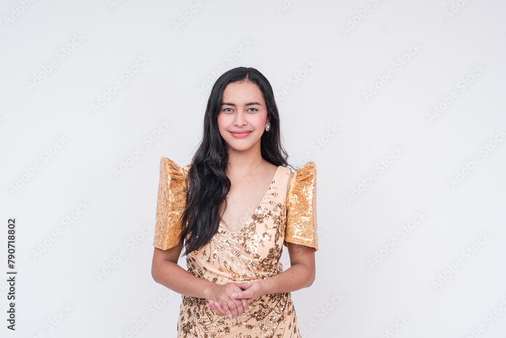 Elegant Filipino woman in traditional Filipiniana dress posing for a proposal Elegant Filipino woman in traditional Filipiniana dress posing for a proposal