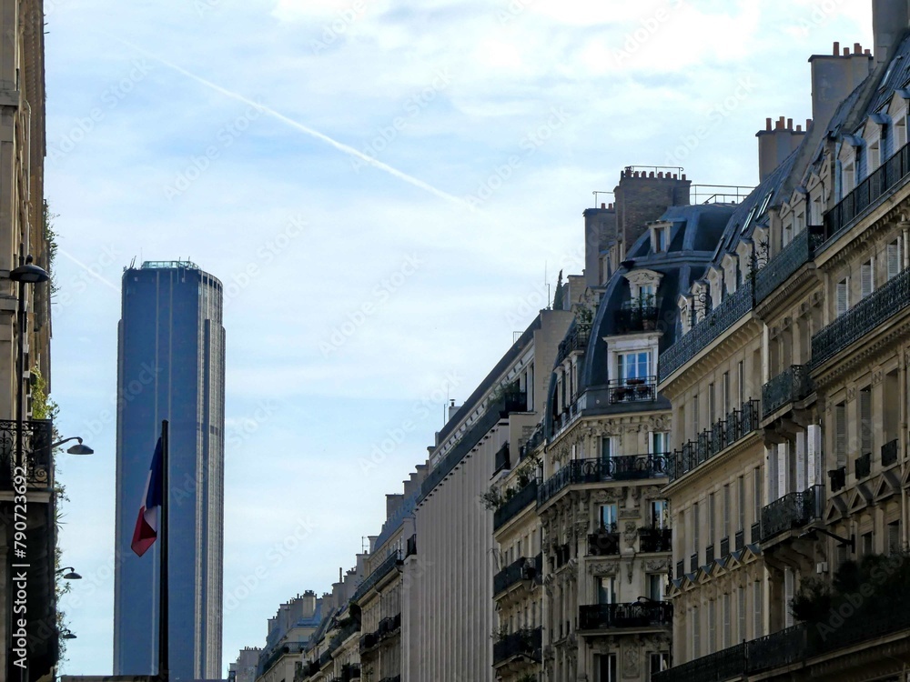 Paris, April 2024 : Visit of the magnificent city of Paris, Capital of France - View on different facades of buildings built by Baron Haussmann