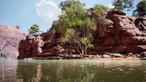 landscape with red sandstone rock and river photo