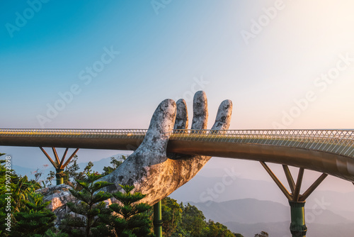 Golden Bridge in Bana hills, enjoying the morning , Danang Vietnam photo