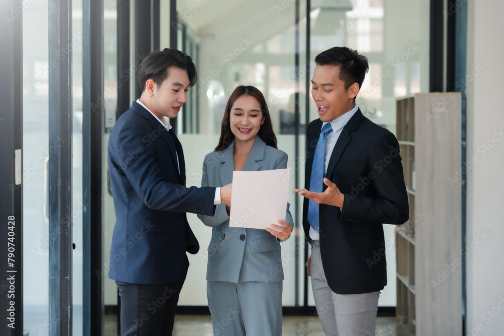 Female business leader presenting graphs to team. Leadership and business strategy concept. Female business leader presenting graphs to team. Leadership and business strategy concept.