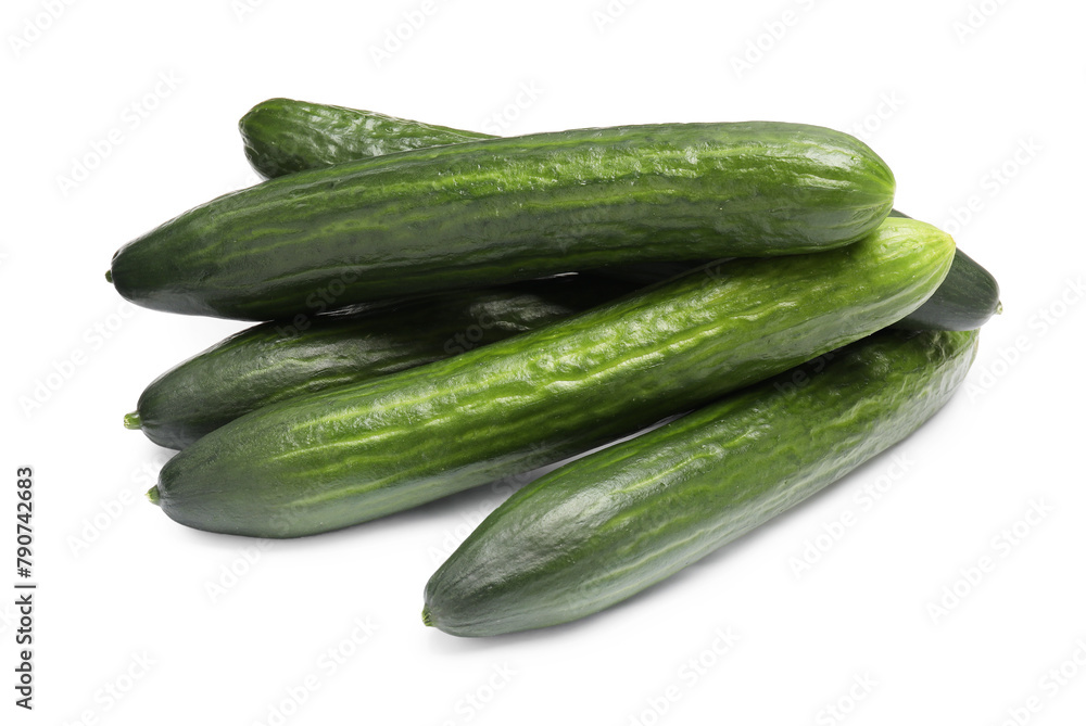 Many long fresh cucumbers isolated on white Many long fresh cucumbers isolated on white