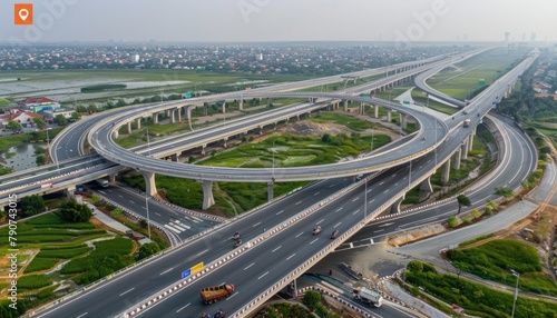 A birdseye view of a bustling highway interchange in a metropolitan area © ЮРИЙ ПОЗДНИКОВ