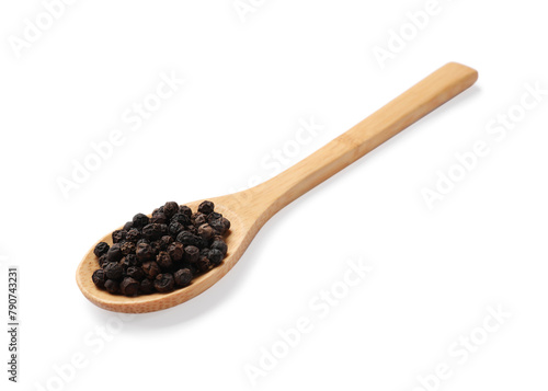 Aromatic spice. Many black peppercorns in spoon isolated on white