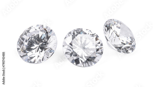 Three beautiful shiny diamonds isolated on white