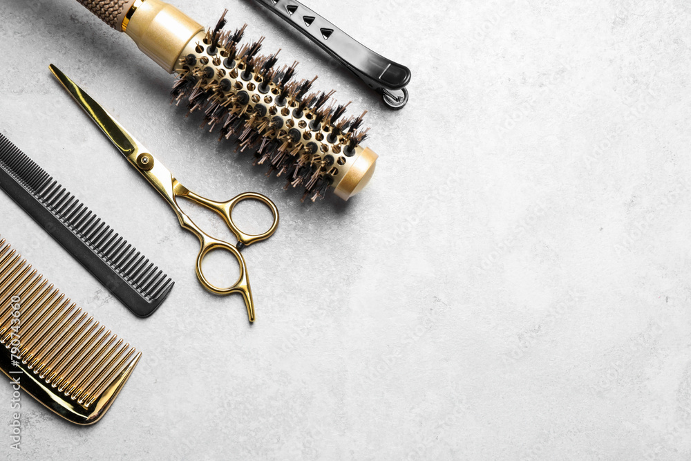 Hairdressing tools on light background, flat lay. Space for text Hairdressing tools on light background, flat lay. Space for text
