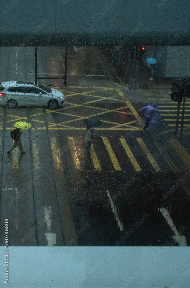 walking people in the rain