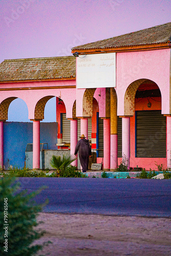 dog in front of a housean over hapiness street  photo