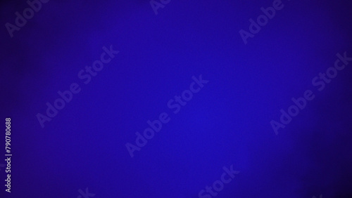 Dark blue grainy background with a black shade