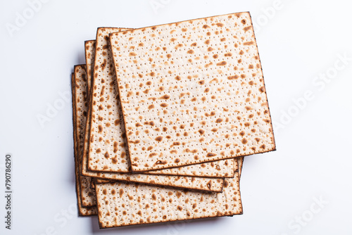 Matzah on white background. Traditional bread for the Jewish holiday of Passover.