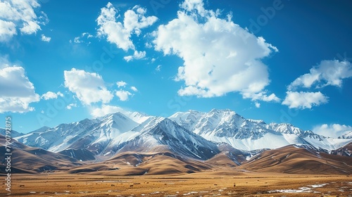 Mountain landscape with snow and blue sky, Kyrgyzstan photo