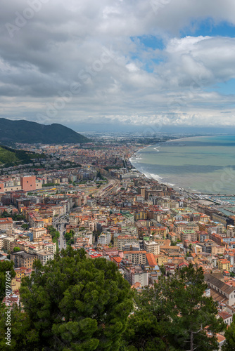 Densely populated areas of the Italian city of Salerno. Salerno is a city and port on the Tyrrhenian Sea in southern Italy, the administrative center of the Salerno province of the Campania region.