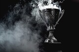 Champion trophy with smoke on black background. Award concept. Selective focus