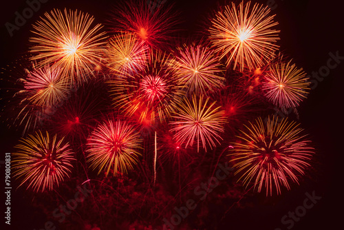 Red Firework celebrate anniversary happy new year 2024  4th of july holiday festival. red firework in night time celebrate national holiday. Countdown to new year 2025 festival party time event