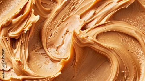 Creamy peanut butter as background, closeup. Food background