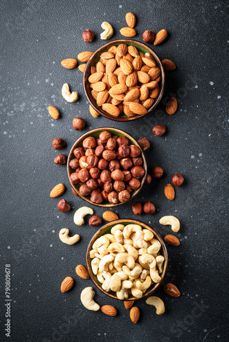 Nuts assortment at black background. Top view.