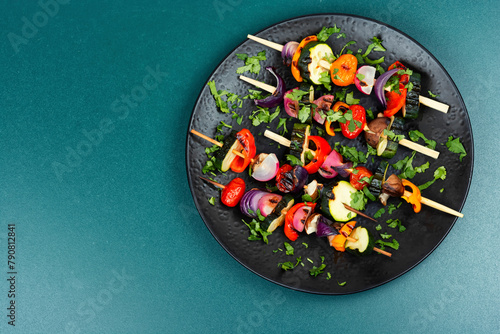 Grilled vegetables on skewers, copy space.