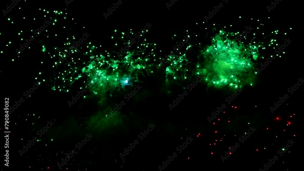 Bright fireworks are ignited, lighting up the dark night sky with colorful bursts and explosions Bright fireworks are ignited, lighting up the dark night sky with colorful bursts and explosions