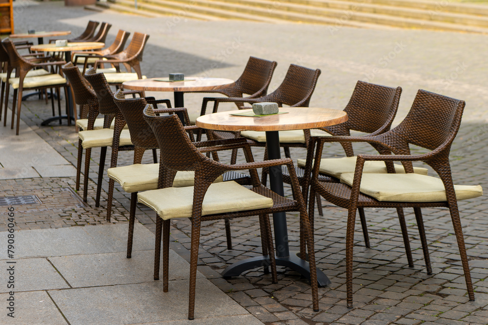 empty street cafe with chairs