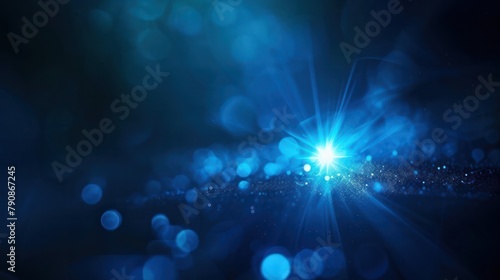 abstract blue of lighting for background. digital lens flare in black background