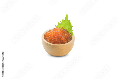 Salmon roe marinated in soy sauce In a wooden cup and shiso leaf on a white background (isolated & Clipping path)
