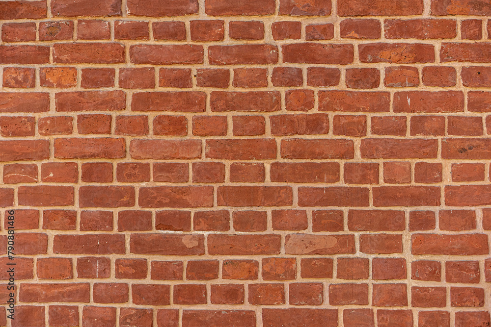 Empty brick red wall. background of a old brick house. Empty brick red wall. background of a old brick house.