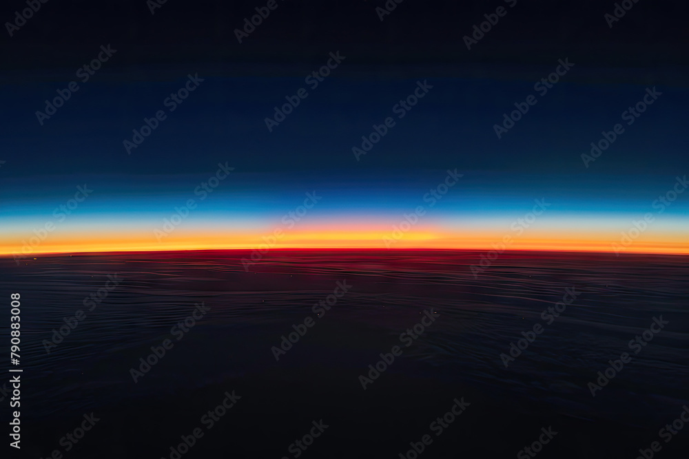 The horizon line, a thin strip of dark blue and red sky at the edge of space