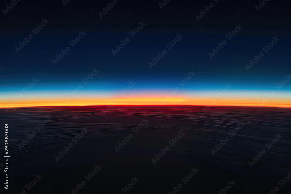 The horizon line, a thin strip of dark blue and red sky at the edge of space The horizon line, a thin strip of dark blue and red sky at the edge of space