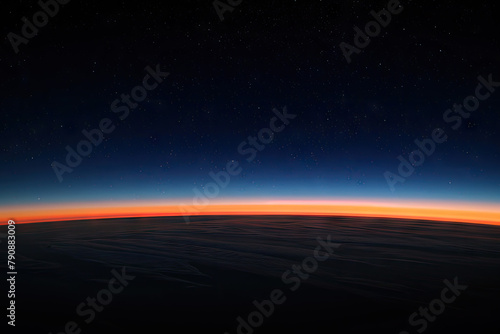 The horizon line, a thin strip of dark blue and red sky at the edge of space