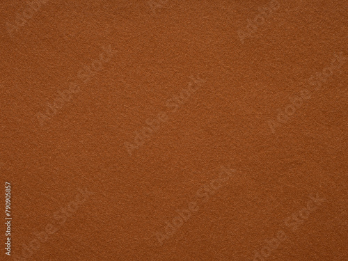Rich cinnamon felt texture, invoking warmth and comfort with its earth-toned, inviting tactile presence