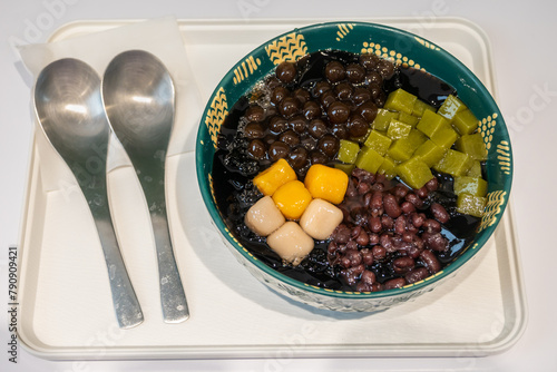 Taiwanese dessert of grass jelly with taro balls, red beans and tea jelly.