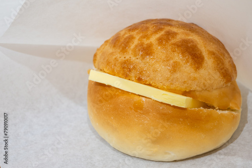 Taiwanese Pineapple bun with a slice of butter.