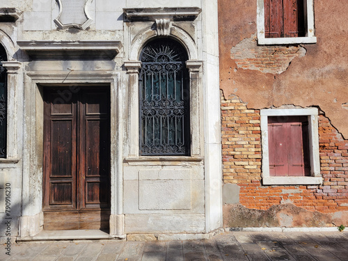 Classic Venetian windows and doors on a building in Venice.  