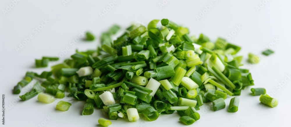 Green onions chopped on a white surface Green onions chopped on a white surface
