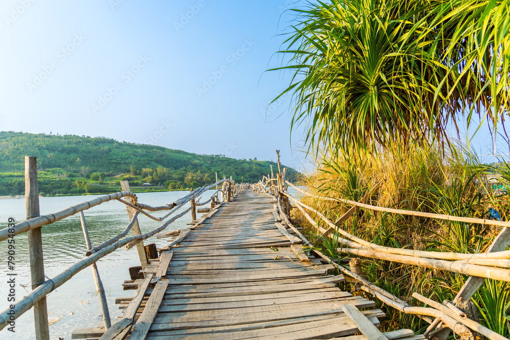 Fototapeta premium View of Ong Cop bridge or Tiger wooden bridge, Vietnam's longest wooden bridge in Chi Thanh district, Phu Yen province, Vietnam