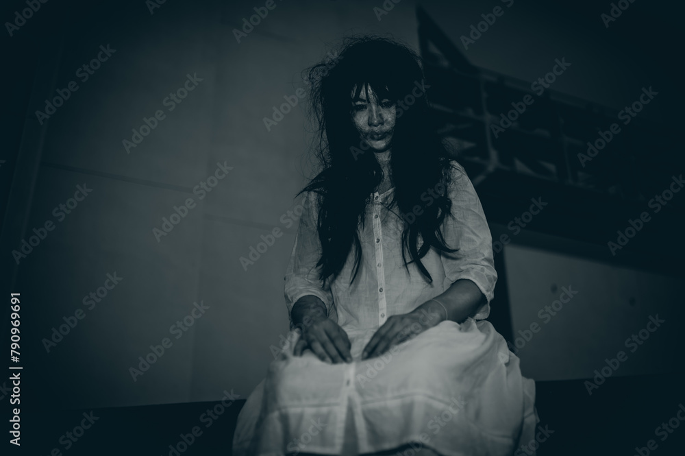 Portrait of asian woman make up ghost face with blood,Horror scene,Scary background,Halloween poster,Thailand people Portrait of asian woman make up ghost face with blood,Horror scene,Scary background,Halloween poster,Thailand people