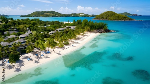 Aerial view of beautiful tropical island with white sand  turquoise ocean and blue sky.