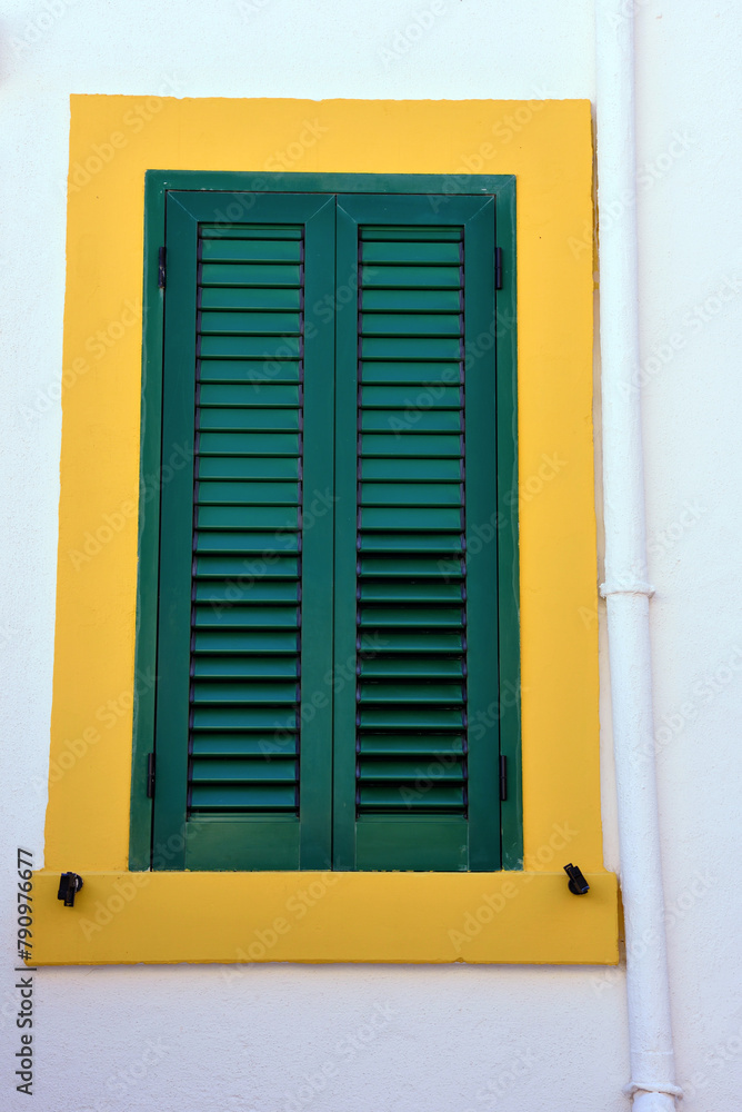 Windows in the historic center of Castro Puglia Italy