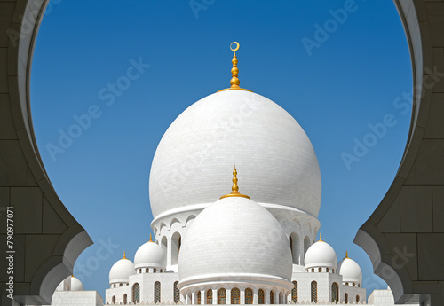 Close-up of Sheikh Zayed Grand Mosque dome with golden crescent in Abu Dhabi © Savvapanf Photo ©