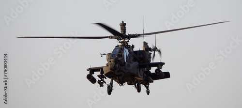 AH-64 Apache helicopter in flight photo