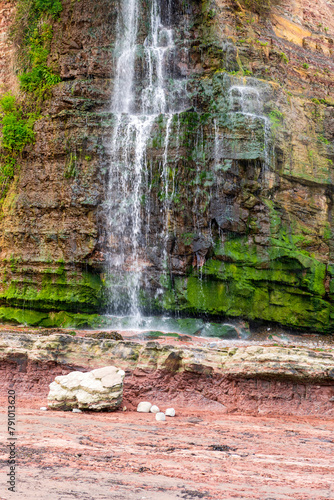 Waterfall at St Audrie's Bay, Somerset, England photo