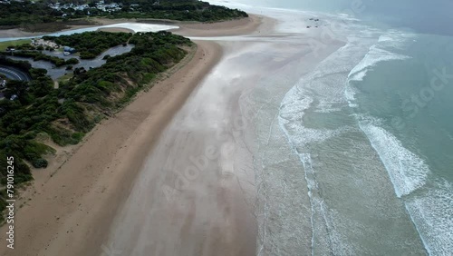 Drone from Loveridge Lookout of the beach and the blue ocean waves at the bay in Anglesea, Australia photo