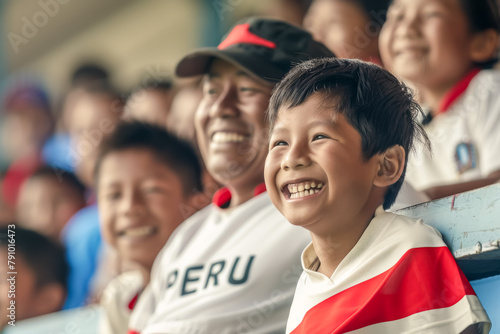 Peruvian football soccer fans in a stadium supporting the national team, father and son, La Blanquirroja 