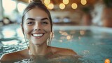 Joyful woman showcases happiness while swimming indoors, emphasizing the delight of water activities. Concept Indoor Swimming, Joyful Exercise, Water Activities, Happiness, Delightful Moments