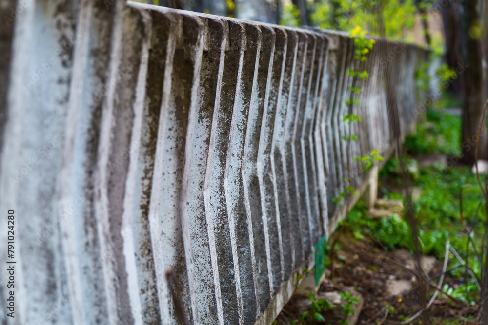 Concrete fence with diagonal elements Concrete fence with diagonal elements