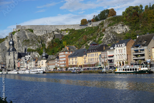 view of the town of Dinant in Belgium on the Meuse river with the old stone fort above  © poupine