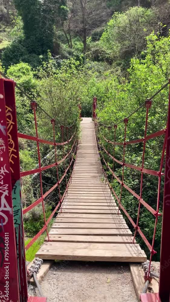 Hiking trail of Sabina over Monachil river in Monachil, Granada, Spain Hiking trail of Sabina over Monachil river in Monachil, Granada, Spain