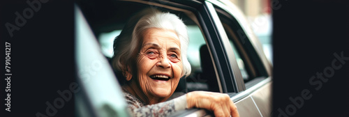 smiling old woman driving a car. banner