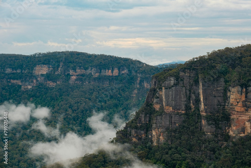 Majestic Vistas: Blue Mountains with Cloud-Drifted Valleys